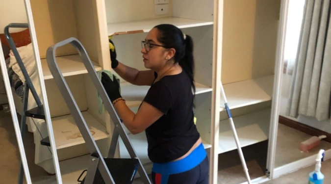 Woman cleaning home for pre-sale cleaning